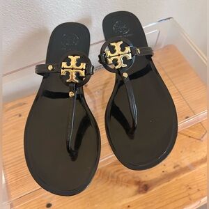 Tory Burch Black Patent Jelly Miller Thong Sandals with Gold Logo